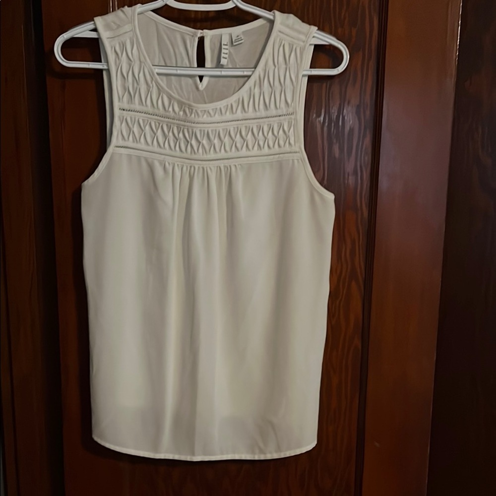 Elle White Sleeveless Blouse with Bib Collar and Embellishments